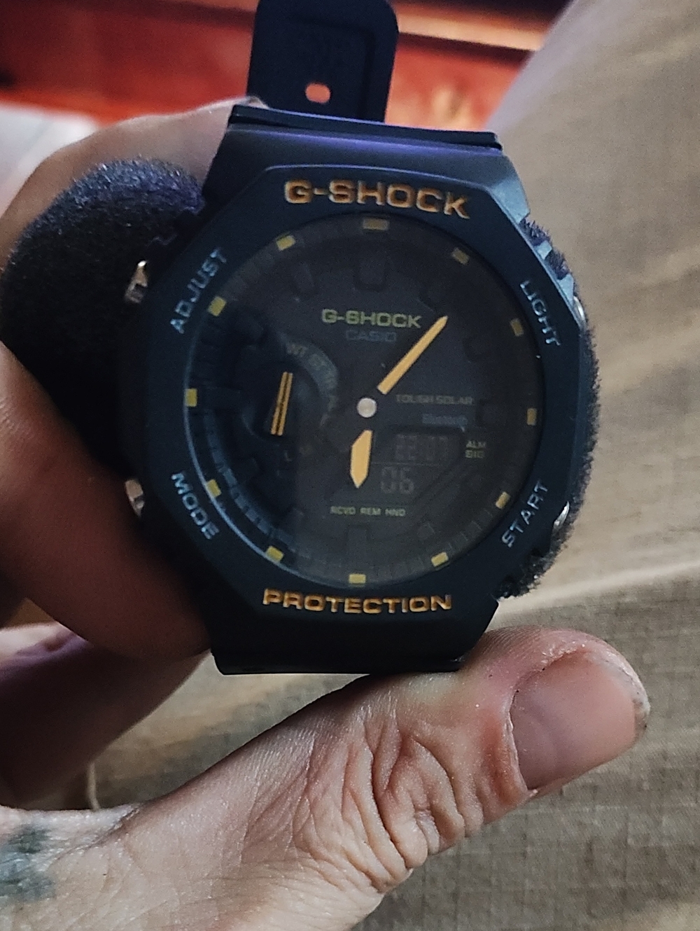 Casio G-Shock Black Watch with Gold Accents